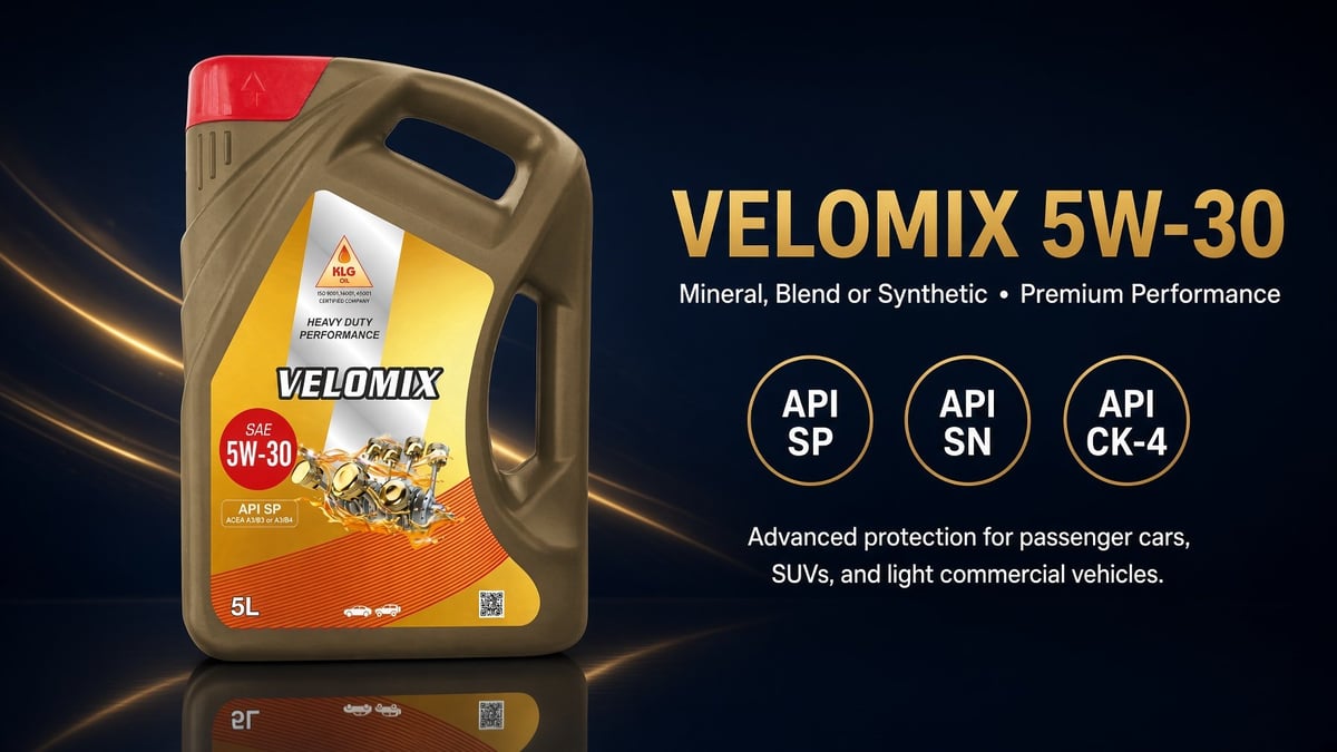 VELOMIX 5W-30 motor oil bottle with product details showing API ratings and specifications on dark background