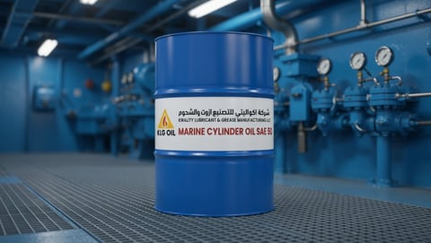 Blue industrial oil drum labeled Marine Cylinder Oil SAE 15 in a factory setting with equipment in background